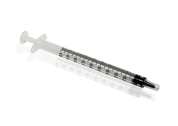 Permanently attached needle Syringe