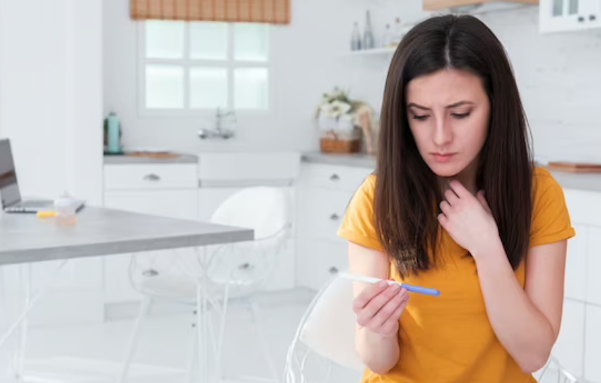 Lady is checking HCG test results