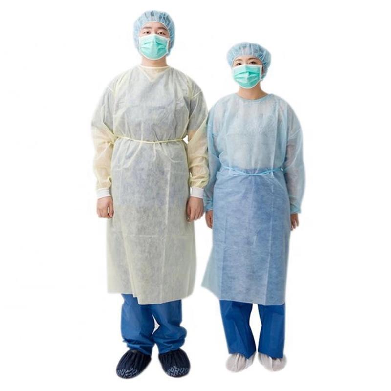 Medical staff wearing yellow and blue disposable medical isolation gowns